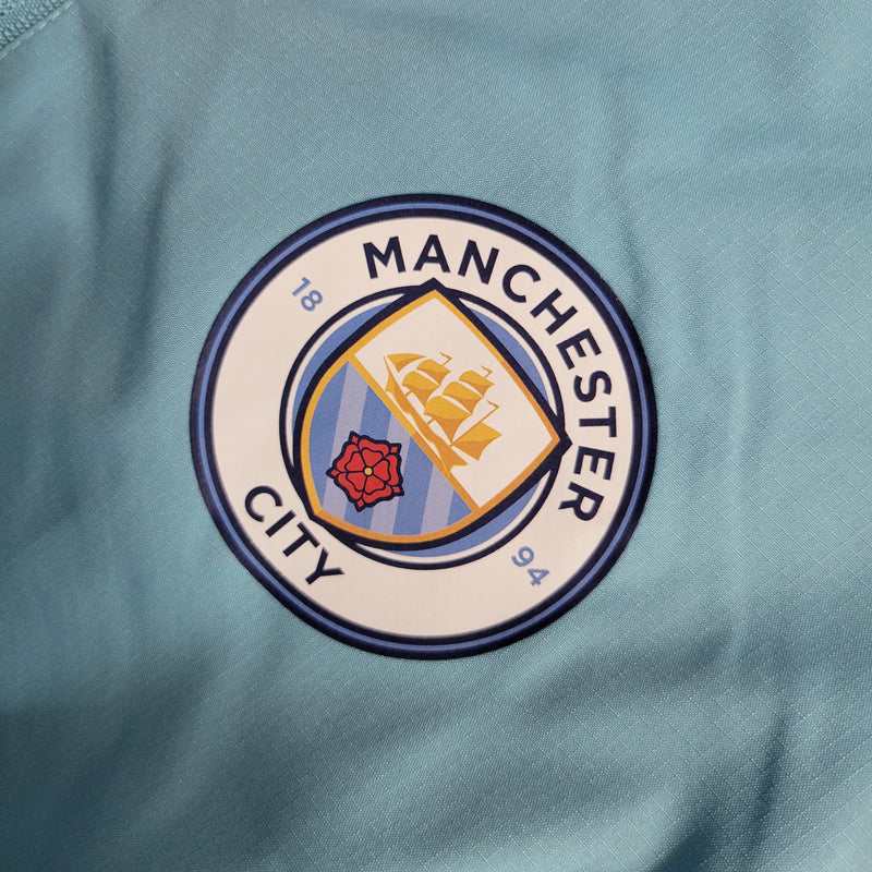 Jaqueta Corta Vento Manchester City 23/24 - Azul e Branca-Krauze Sports